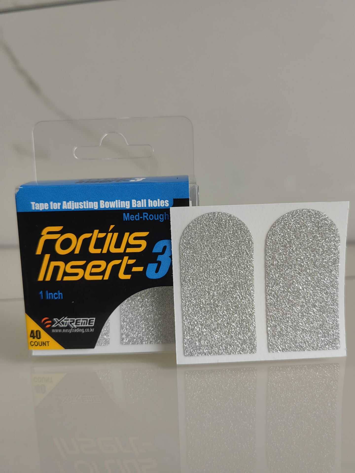 The Xtreme brand bowling finger hole finger patch FIRTIUS Insetr adjust the finger hole size and the touch touch