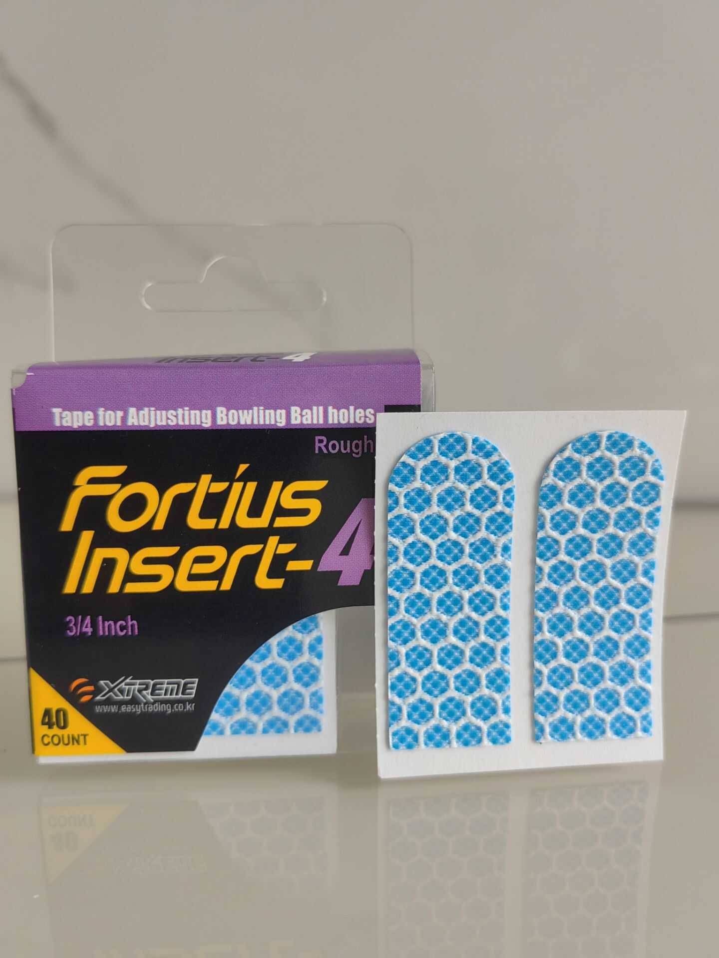 The Xtreme brand bowling finger hole finger patch FIRTIUS Insetr adjust the finger hole size and the touch touch