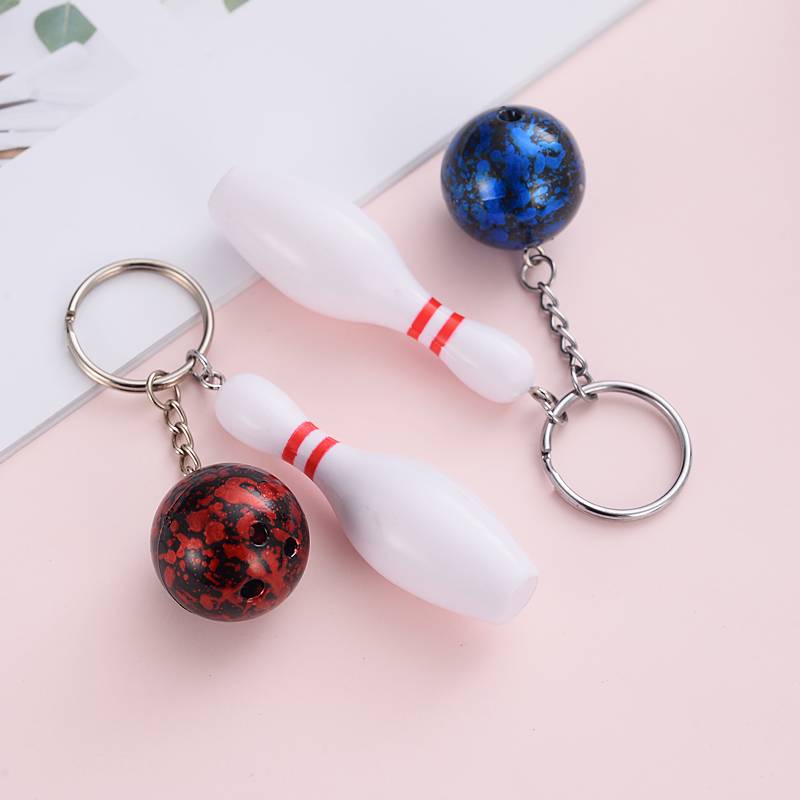 Mini-baby key buttons attached to a bowling kit for a souvenir