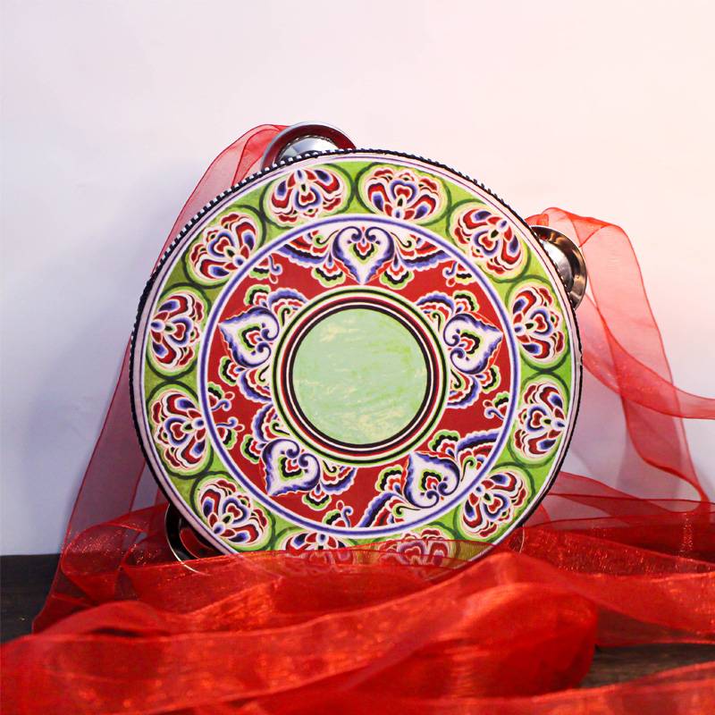 Green and red pattern hand drum