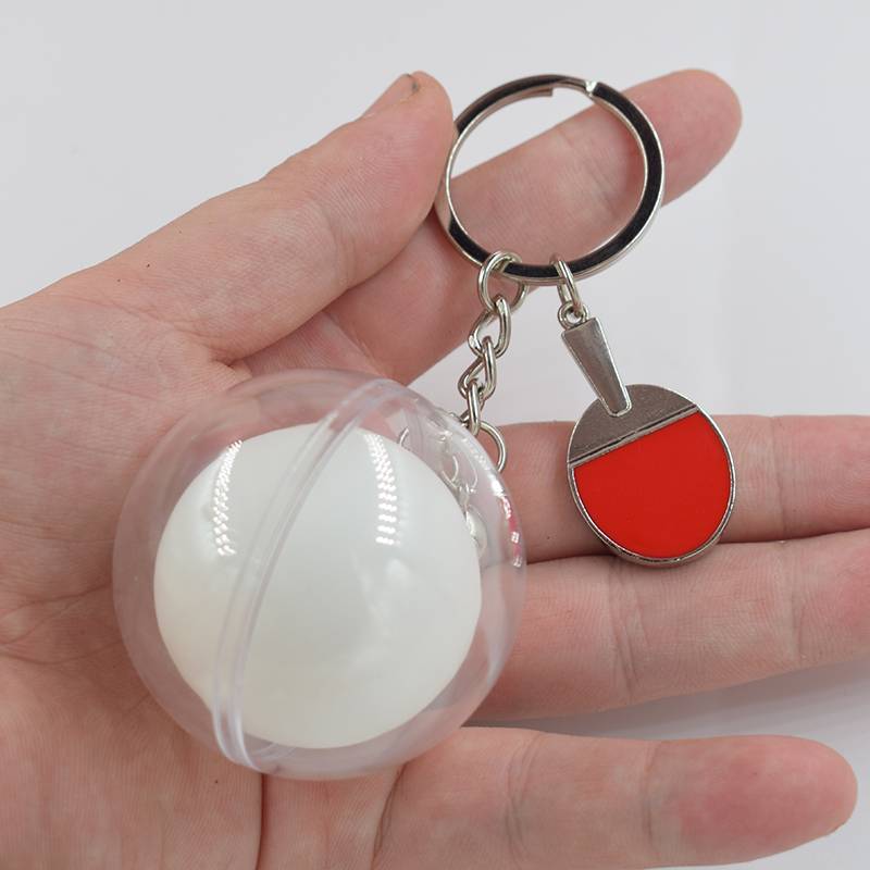 The racket keychain plus white table tennis