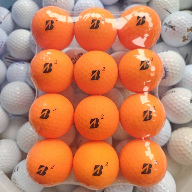 12 golf balls with 9-10% of new Priston Golf coloured second-hand balls were seamlessly packed