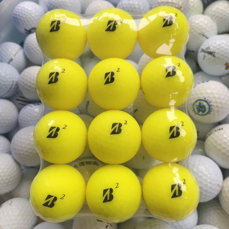 12 golf balls with 9-10% of new Priston Golf coloured second-hand balls were seamlessly packed