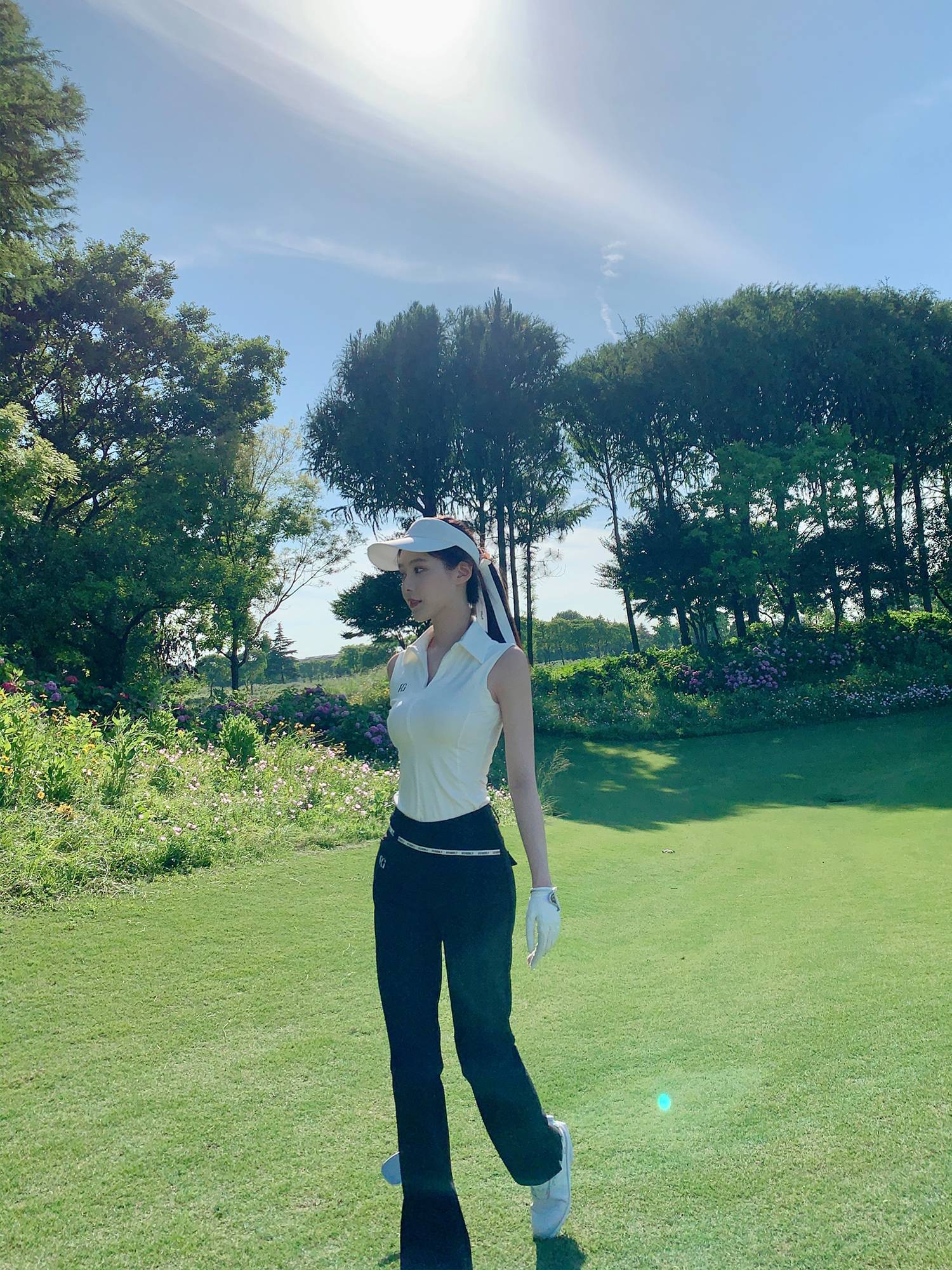 Legolf's sports cuffless polo with a golf crotch suit for her