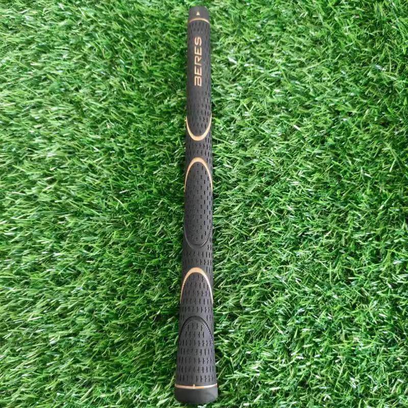 A new golf club, a man with a hawma iron wooden pole, and a rubber handle