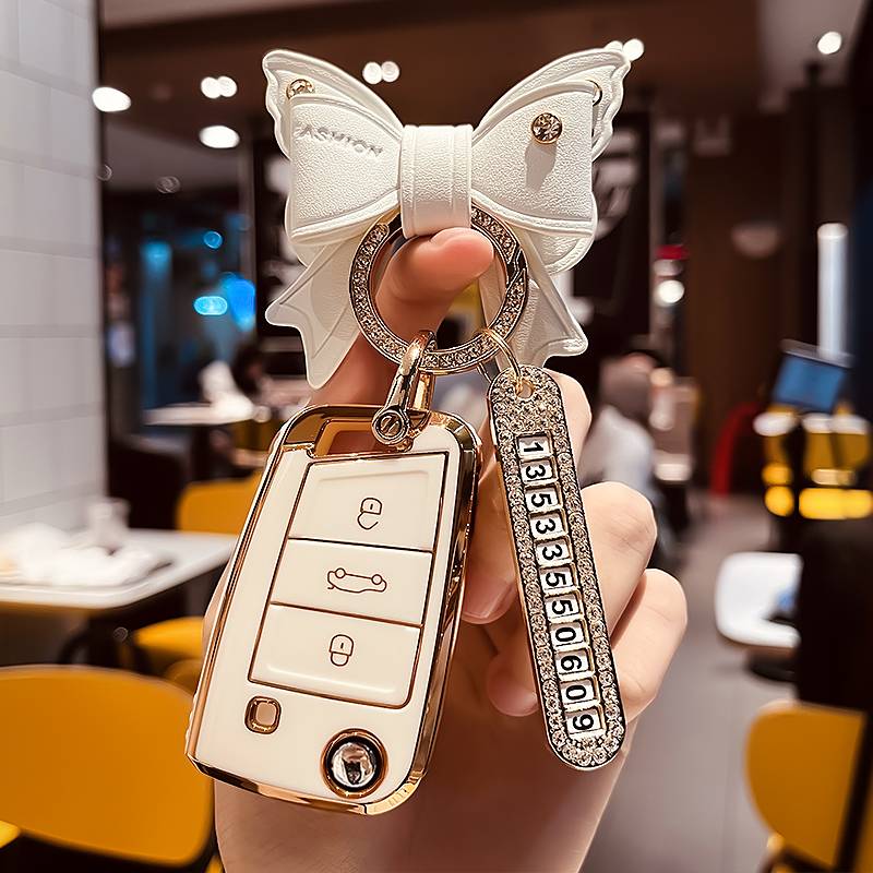 Volkswagen B model-folding 3 keys [single shell white]+golden bow diamond buckle+gold number plate