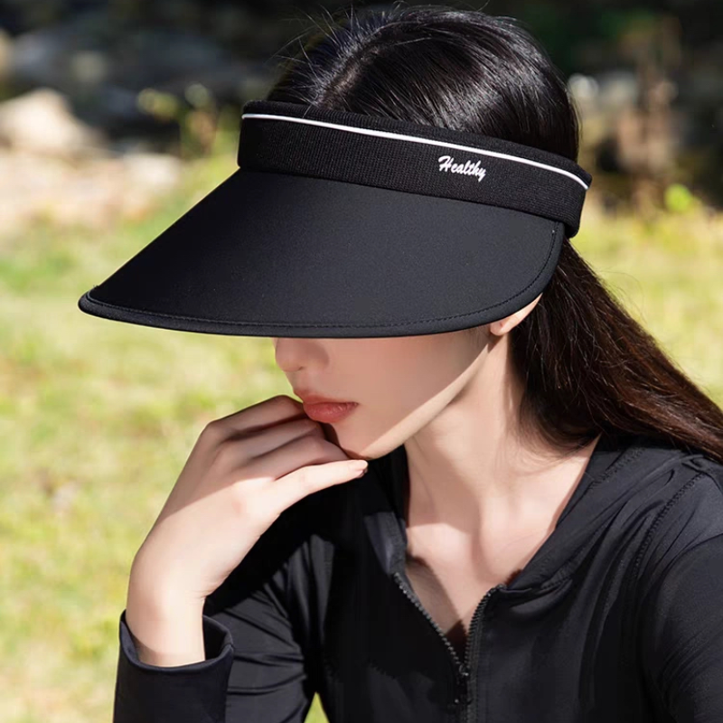 The new golf hat girl with a big hat on top of the sun