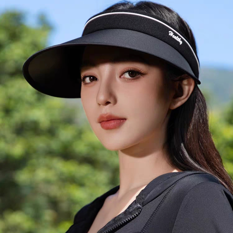 The new golf hat girl with a big hat on top of the sun