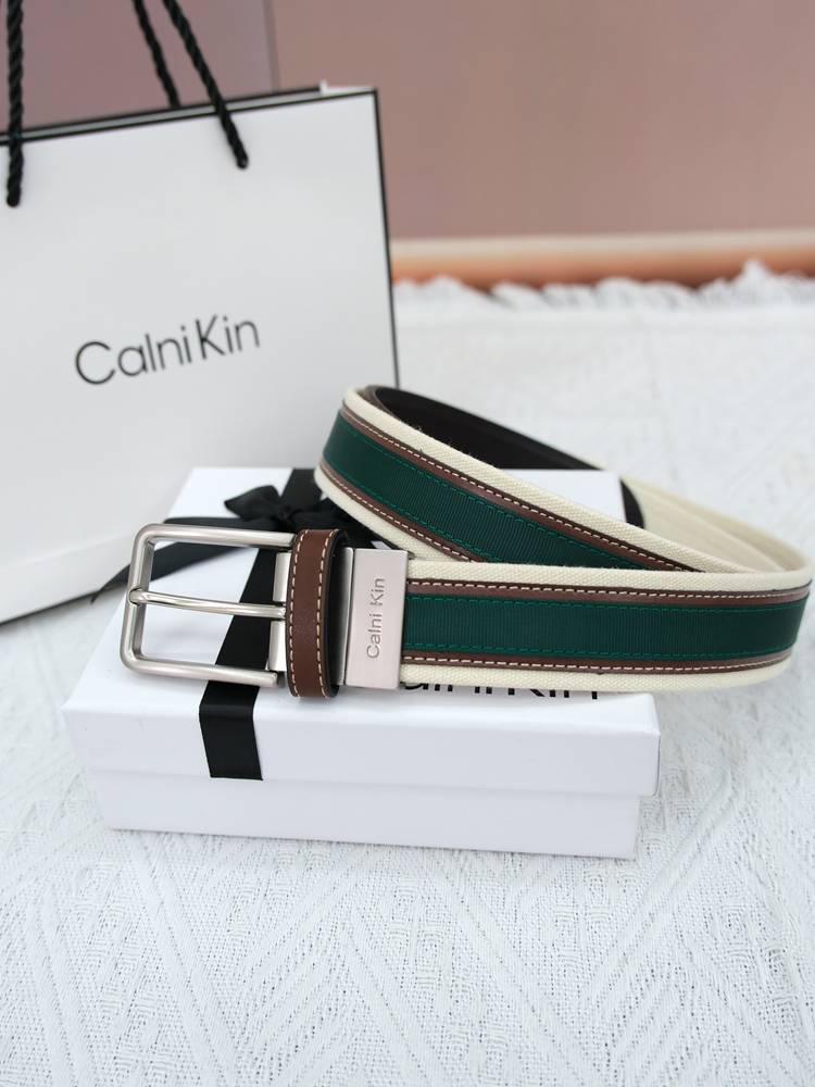 CalniKin leather, leather-skinned canvas man with a pin on his belt and a gulp on his jeans