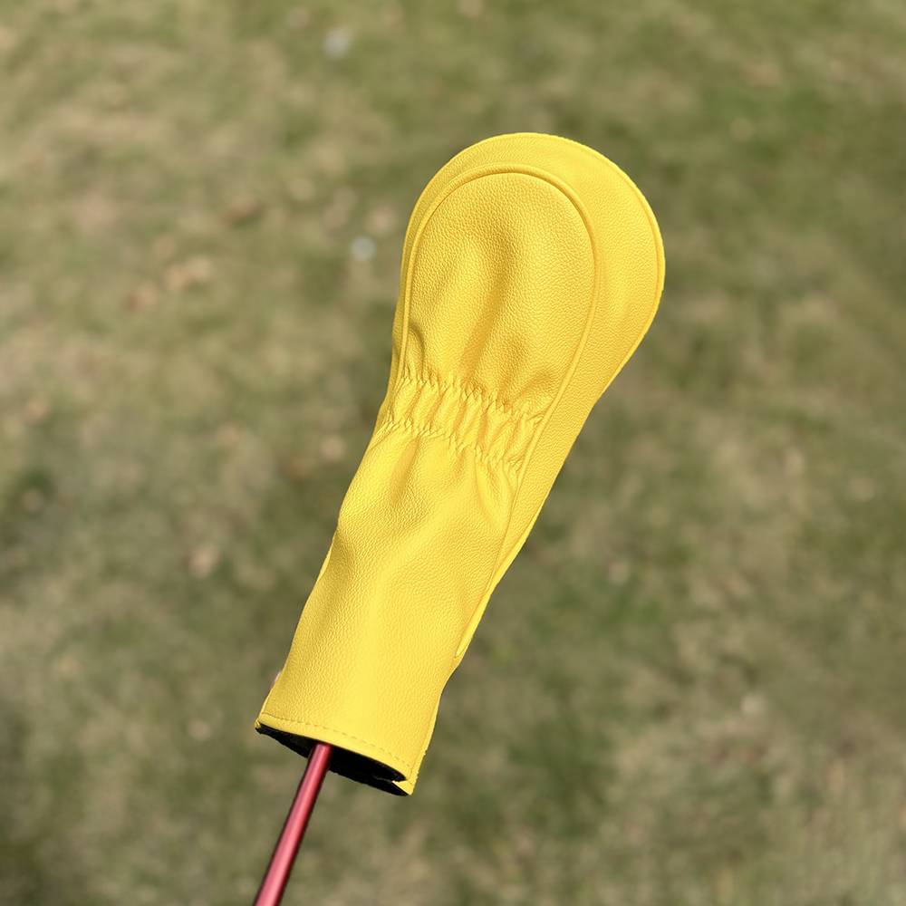A FISHER HAT GOLF CLUB WITH A SUNFLOWER GOLF POLE POLE AND A CHICKEN LEG PROTECTION KIT