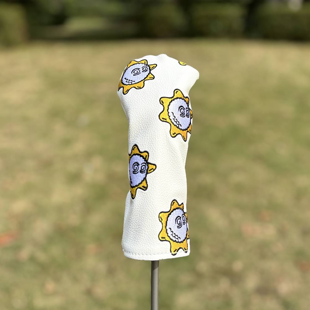 A FISHER HAT GOLF CLUB WITH A SUNFLOWER GOLF POLE POLE AND A CHICKEN LEG PROTECTION KIT