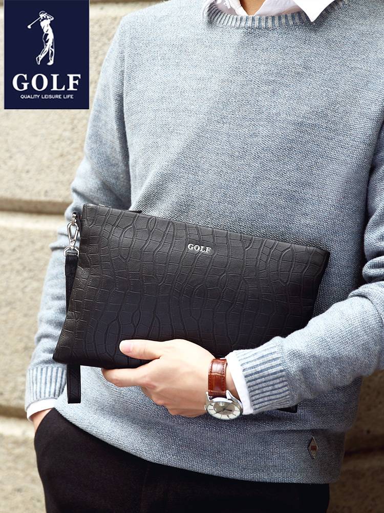 THE GOLF MAN WITH A LARGE BUSINESS CAPACITY GRABS A OX-SKIN-GRASSED ENVELOPE HANDBAG
