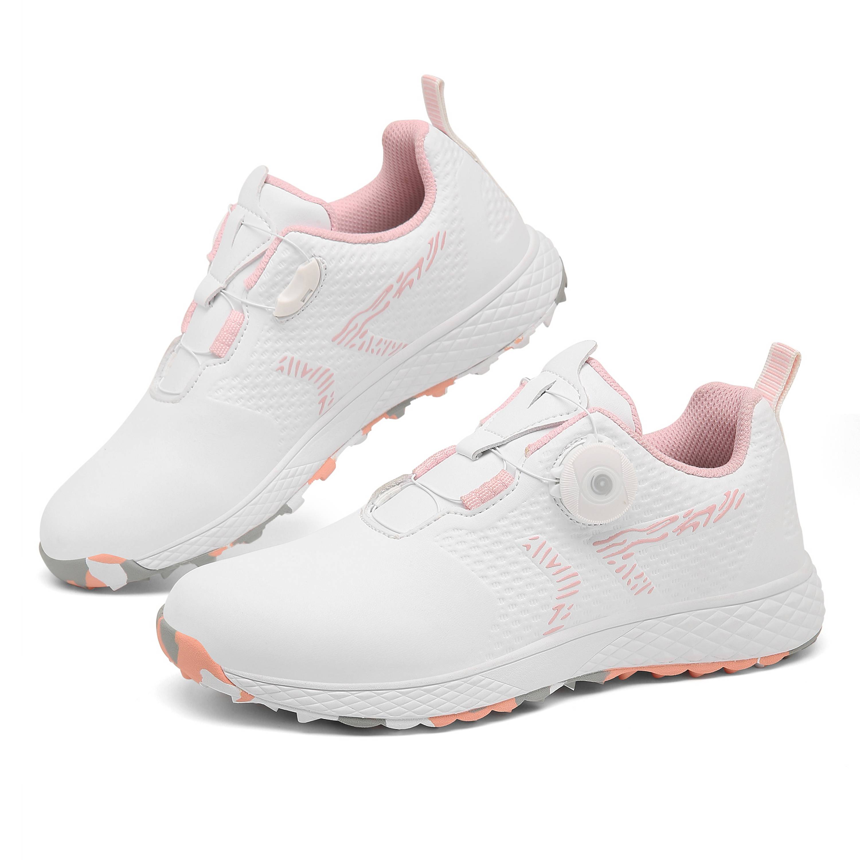 The new lady rotates the golf shoes outside of the house