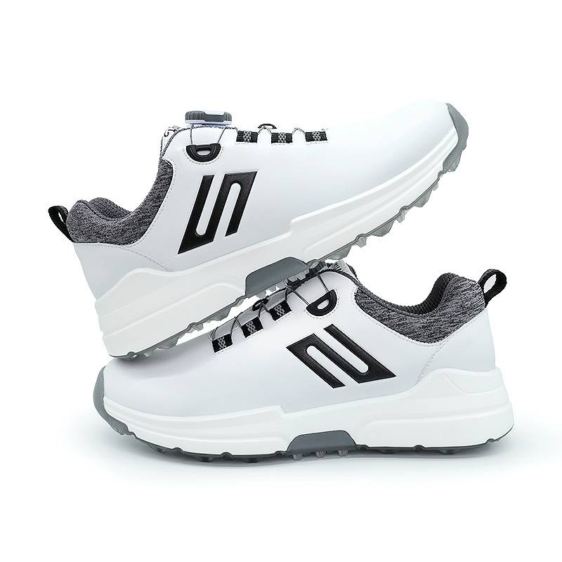 Golf man's slipper-resistant, water-resistant revolving-button belts are pegged in white to increase his leisure outdoor sports shoes