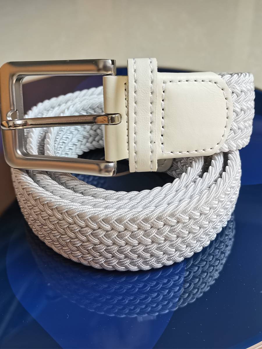 new golf belts, a man and a woman, a man and a woman