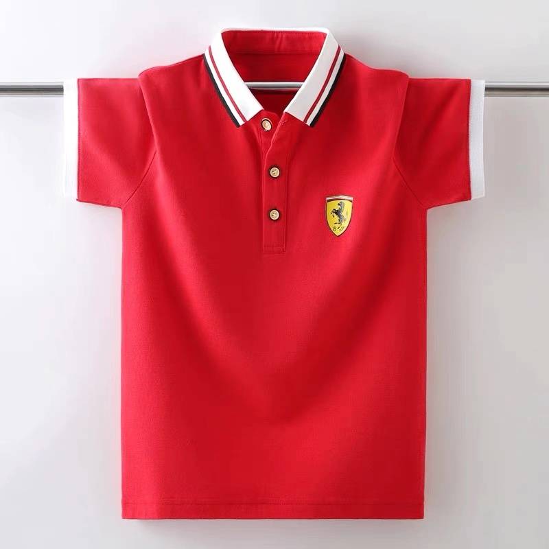 Summer boy with a child golf shirt on his sleeve, golf dress and get a t-shirt for boys
