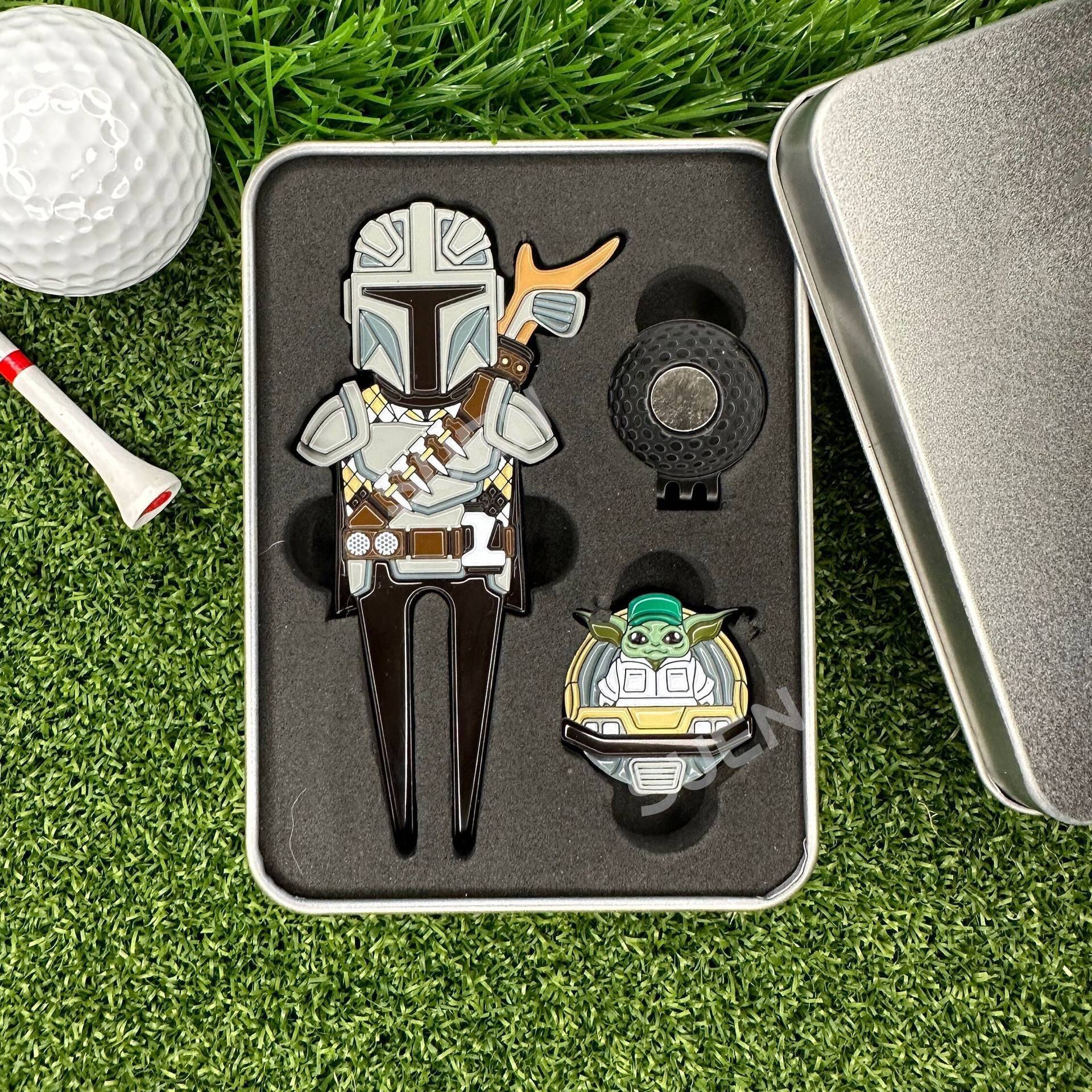 A stand-alone creative golf tool box with a toon character with a fruit-ridge fork set with a magnet-sucking metal ball fork