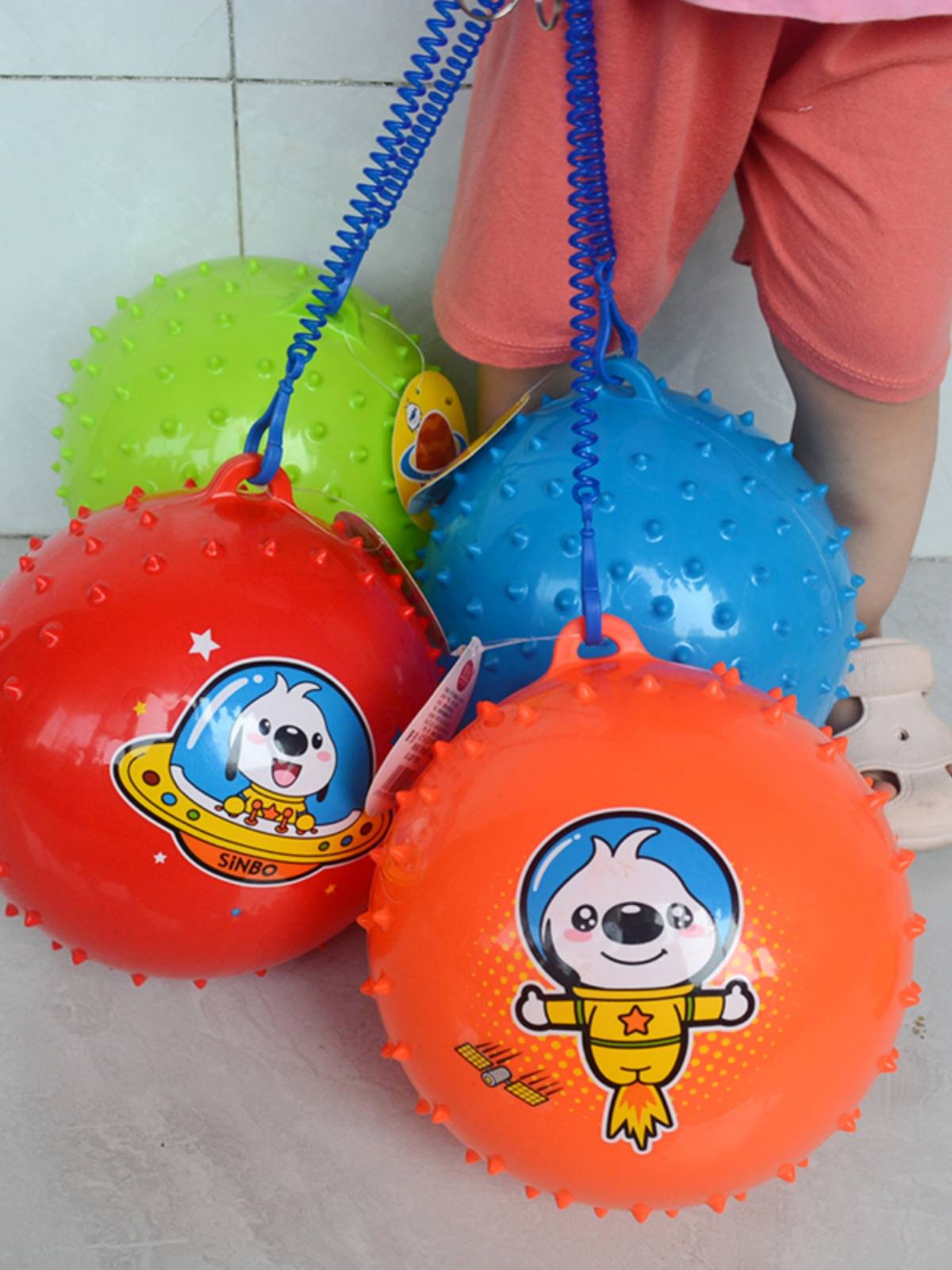 Children's spring chain chain football kindergarten with rope soft massage ball baby elastic shooting toy pull rope stab