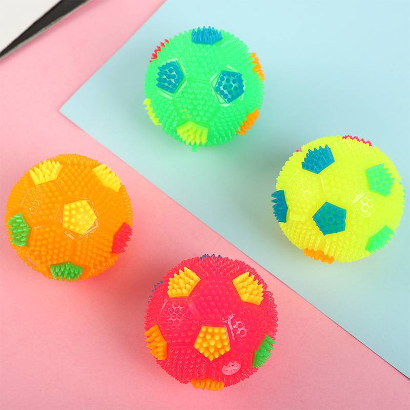 New creative puzzle luminous elastic small football whistle sounds flashing ball thorns early teach children toys