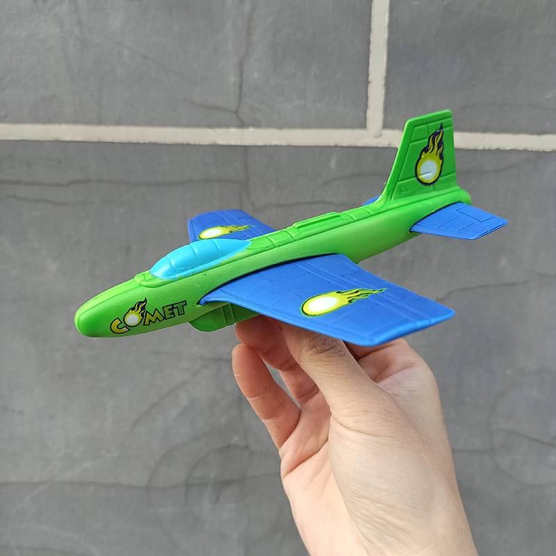 Blue and green hand throw small plane