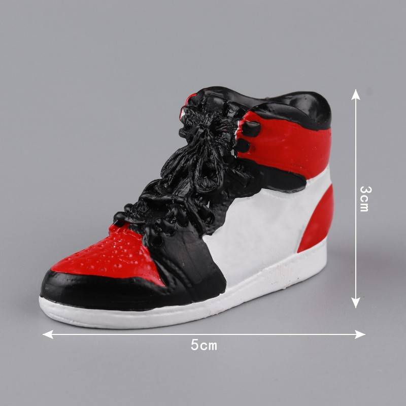 5 red, white and black 5 of resin basketball shoes