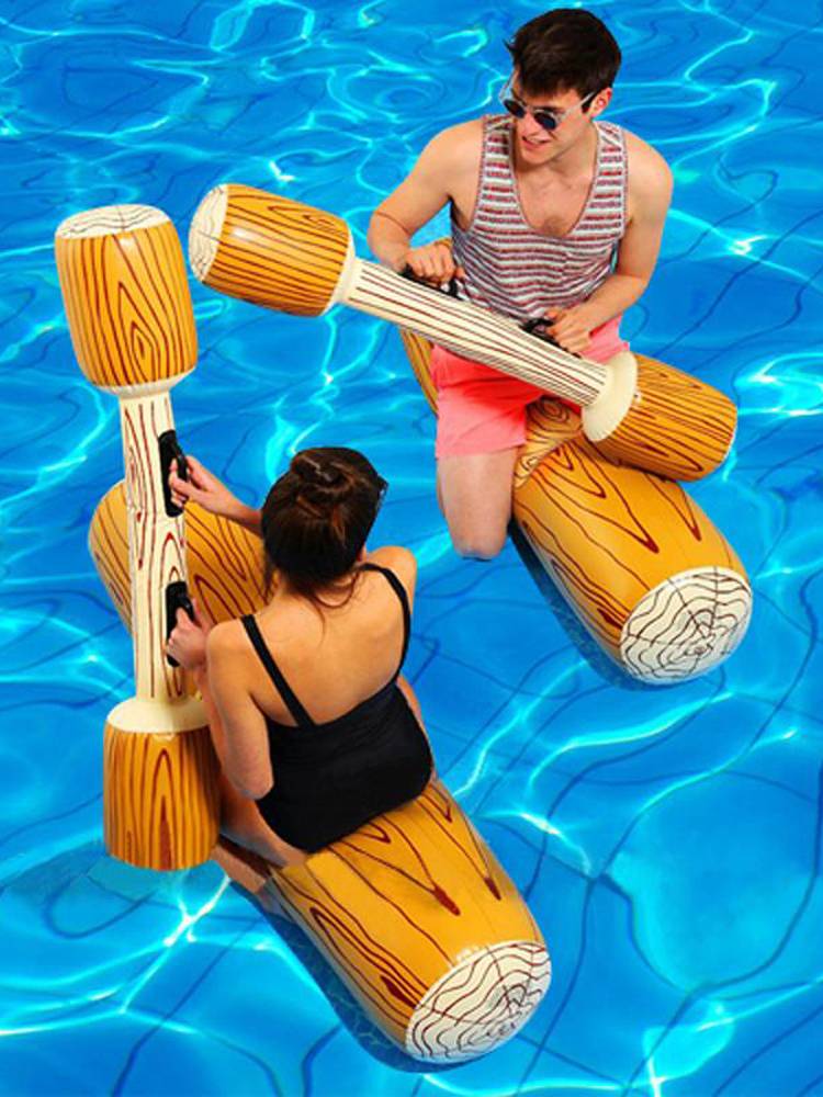 A super-inflated volleyball net floating on a football door and a basketball ball roller
