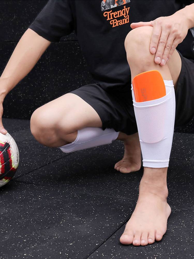Professional high -quality football leg protection board adult children EVA foam carbon fiber -resistant abrasion and anti -collision leggings