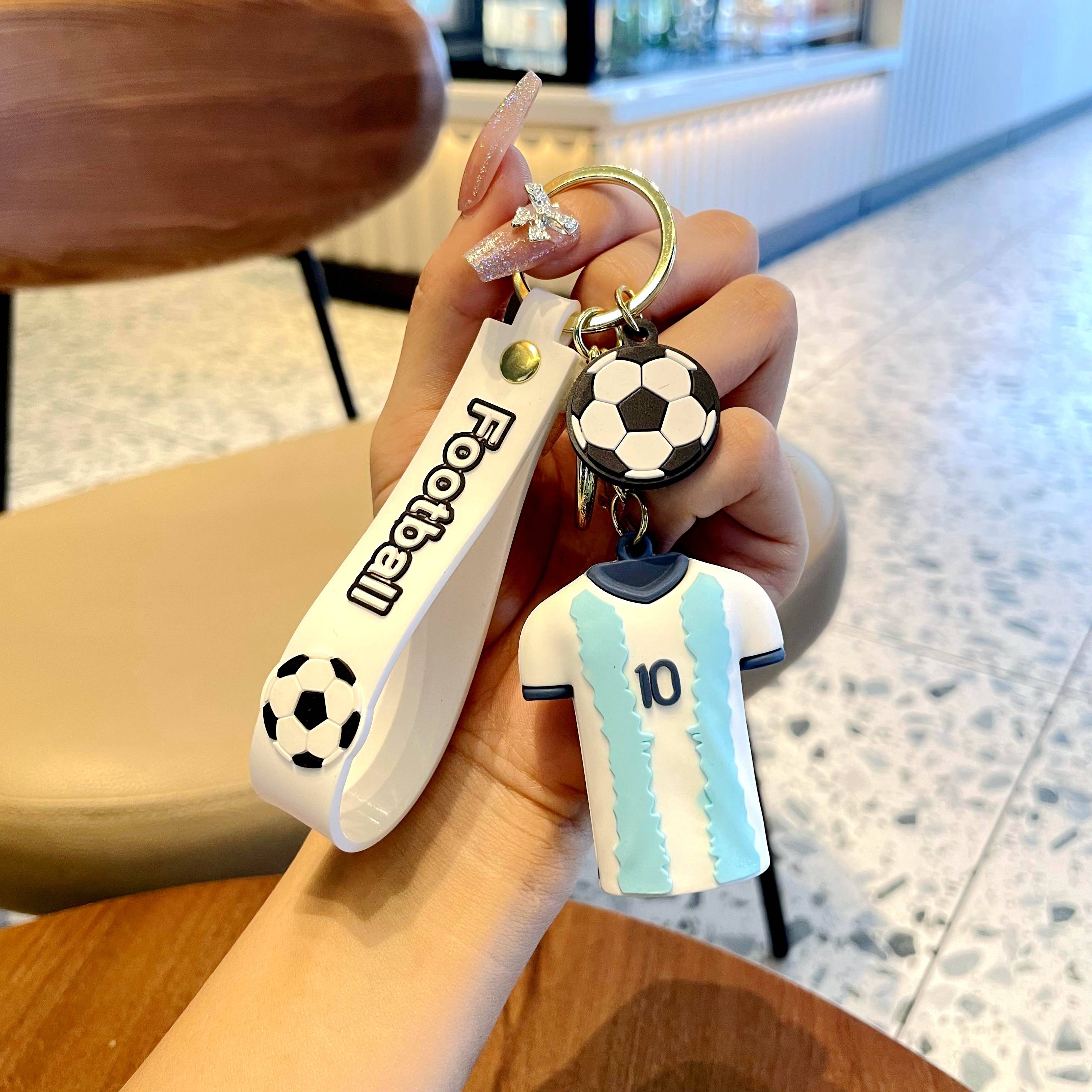 No. 10 blue and white Messi jersey (top)