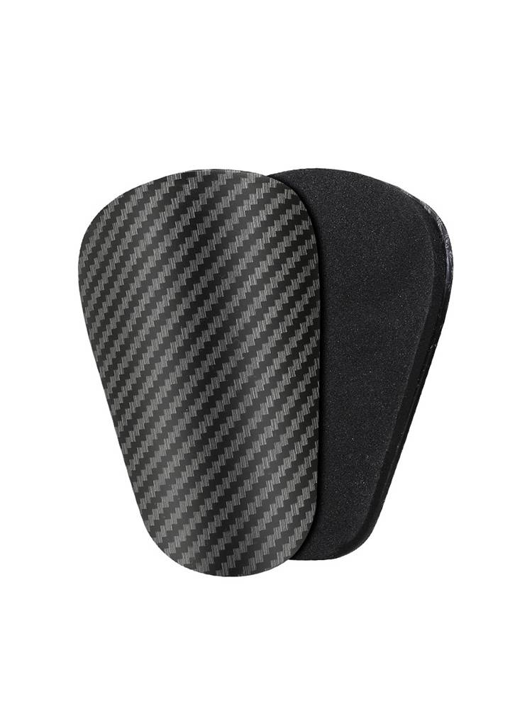 A mini-legged adult carbon-fibre master's plate against a football pin