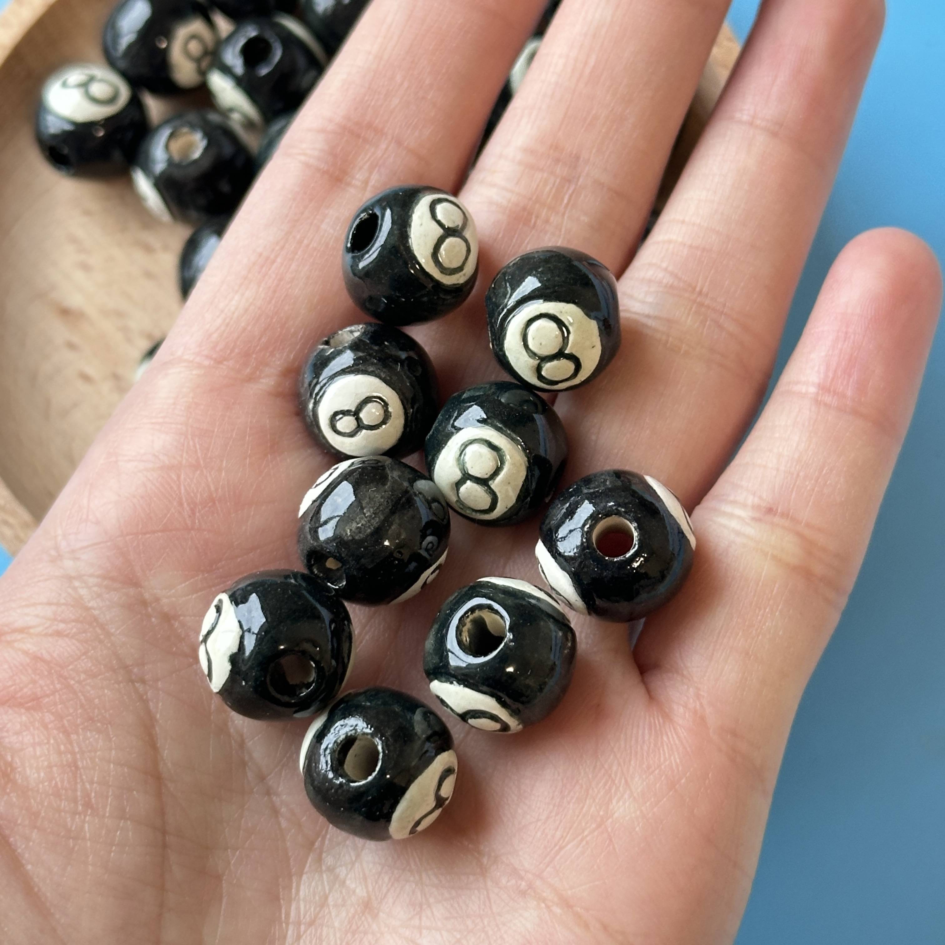 Peruvian ceramic beads black eight rugby baseball football football beaded jewelry materials