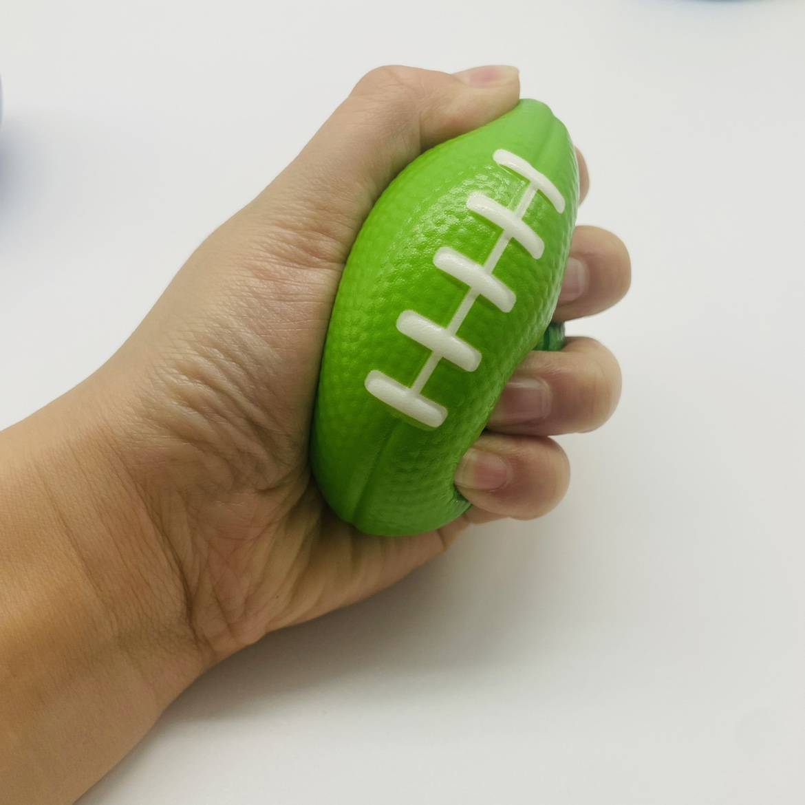 Solid sponge rugby small fitness equipment training ball PC muscle gripper pineral ball toys can be customized