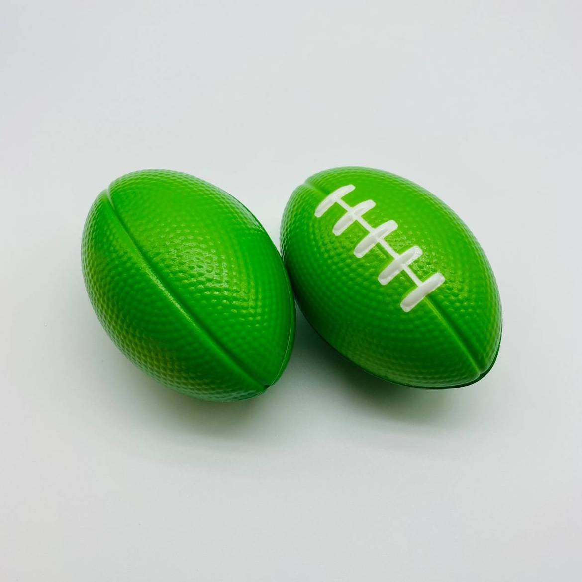 Solid sponge rugby small fitness equipment training ball PC muscle gripper pineral ball toys can be customized