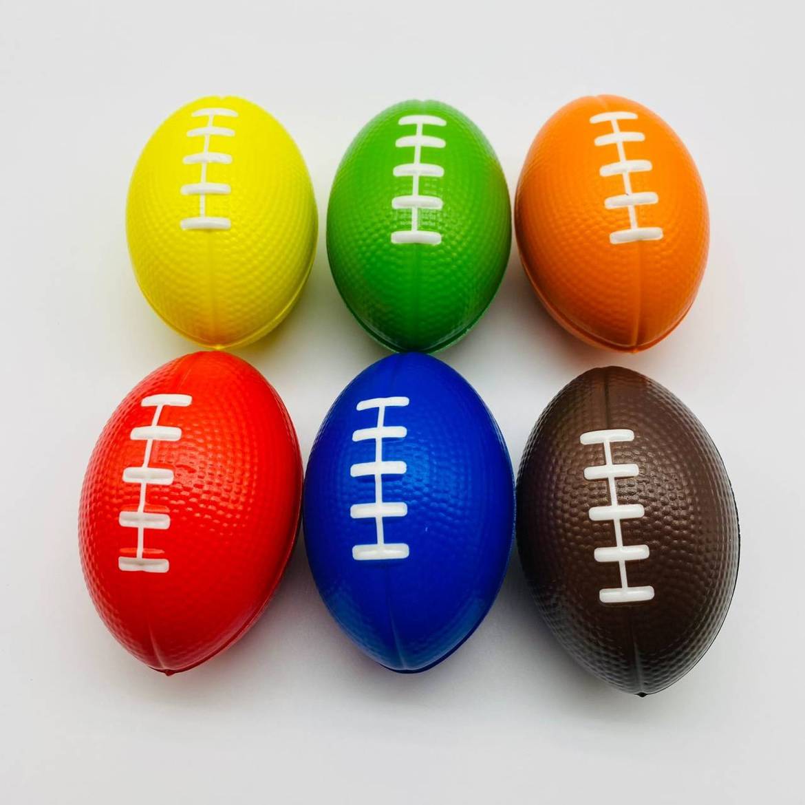 Solid sponge rugby small fitness equipment training ball PC muscle gripper pineral ball toys can be customized