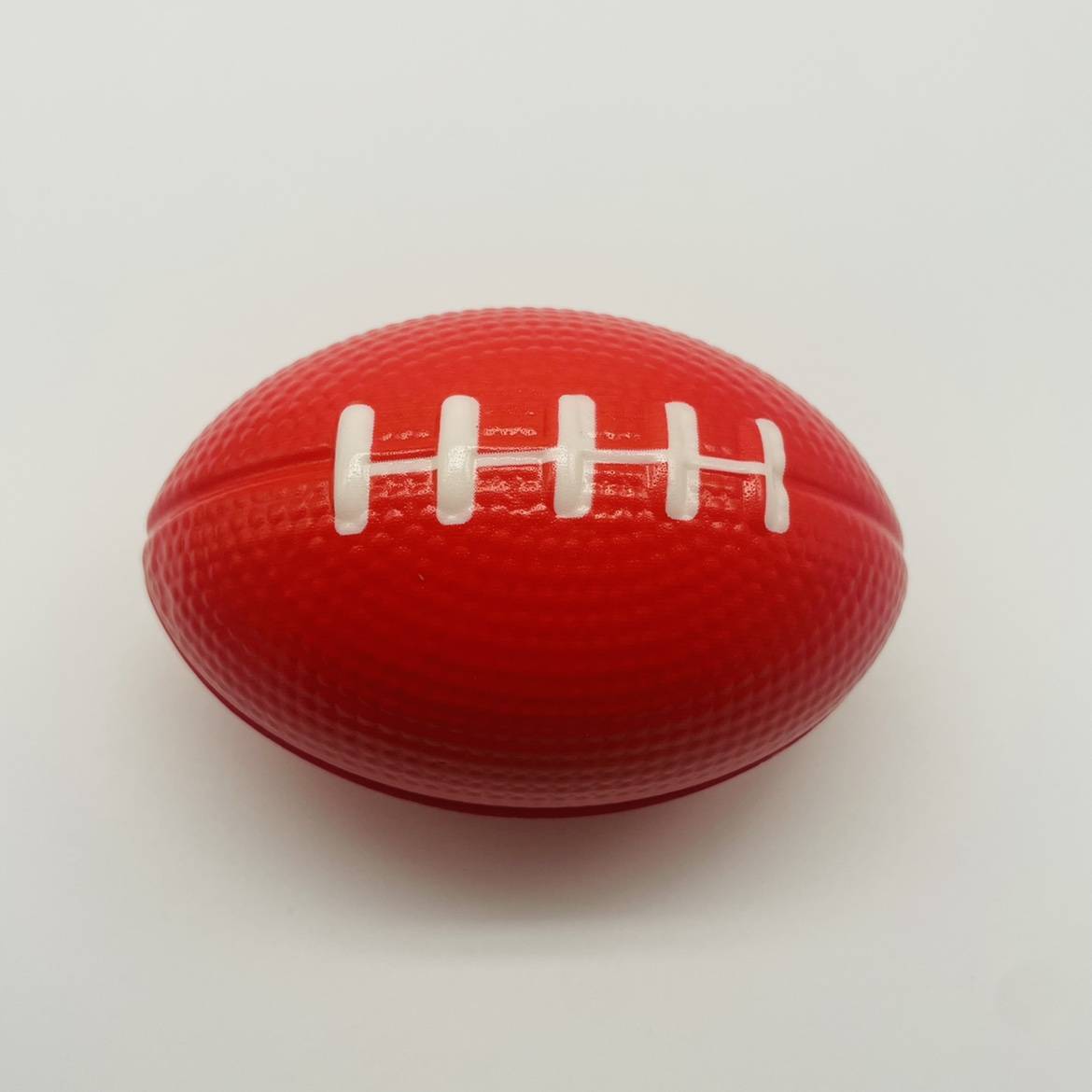Solid sponge rugby small fitness equipment training ball PC muscle gripper pineral ball toys can be customized