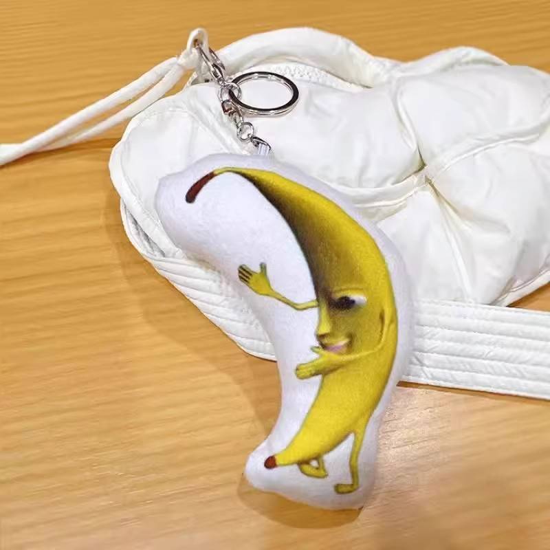 A big banana voice keychain will sound cute creative package pendant doll plush sound toy singing