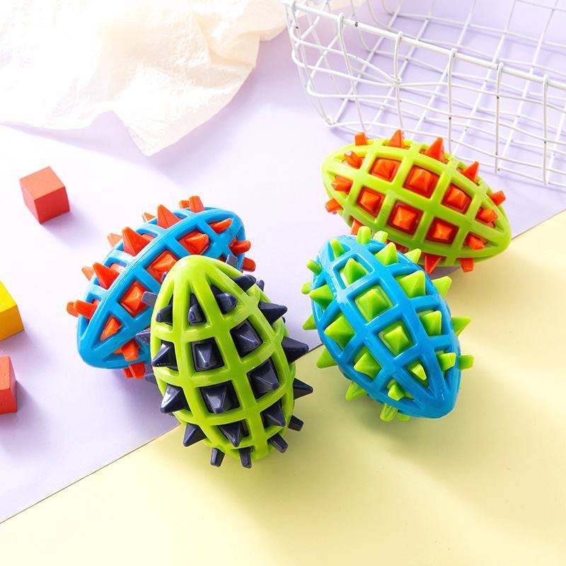 Pet Products Factory Wholesale TPR Pet Toy Double -color Rugby Rugged Modeling Dog Dog toy Cross -border