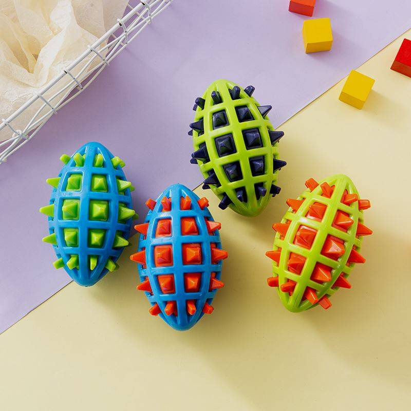 Pet Products Factory Wholesale TPR Pet Toy Double -color Rugby Rugged Modeling Dog Dog toy Cross -border