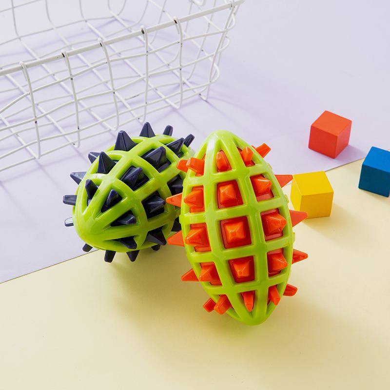 Pet Products Factory Wholesale TPR Pet Toy Double -color Rugby Rugged Modeling Dog Dog toy Cross -border