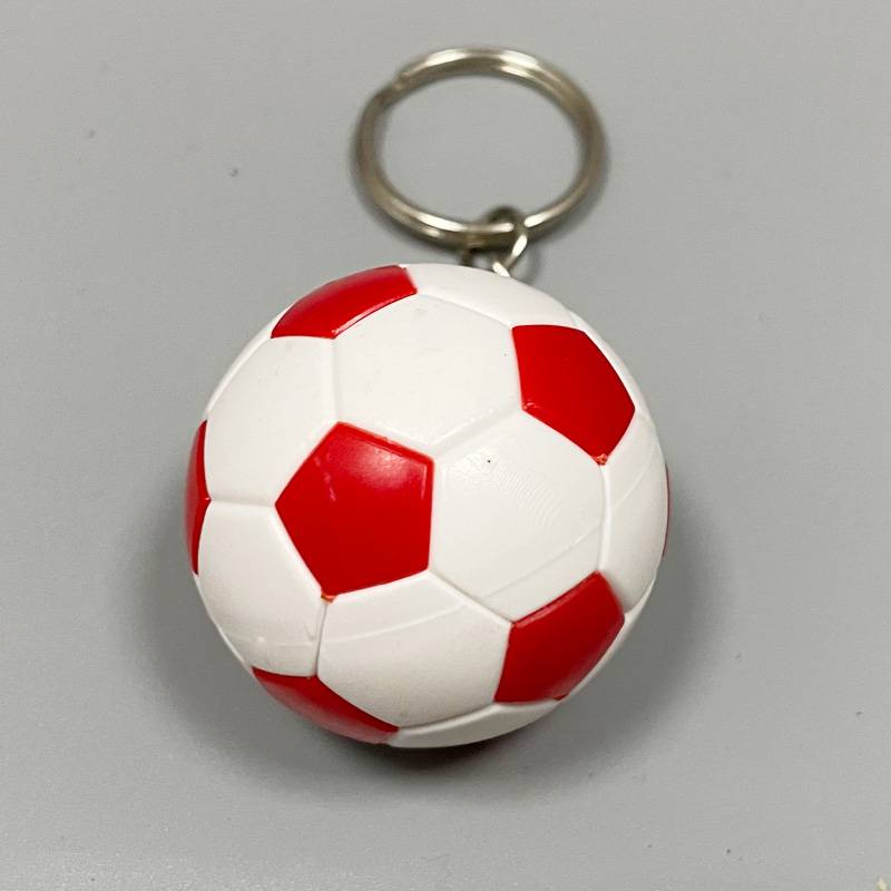 Red and white football keychain