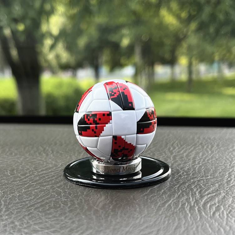 Red and white models of small football ornaments (Messi base)