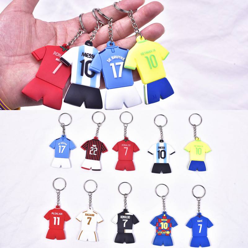 SOCCER KEY BUTTON WITH A LITTLE GIFT STAR ON THE SIDE