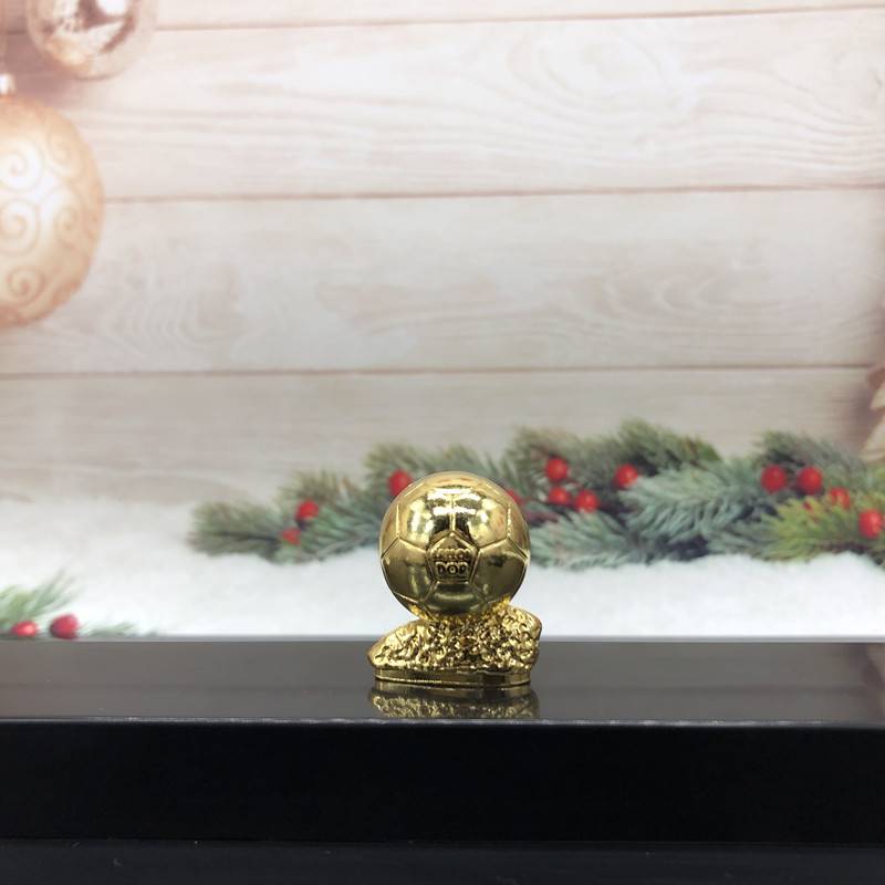 Metal Golden Globe trophy (about 3 cm high)