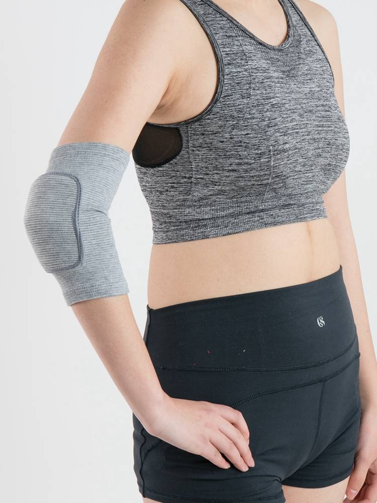 Sports women and sponge boys with elbows to keep their elbows warm to support the gym and dance