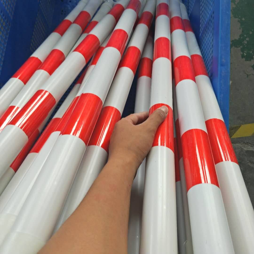 5 red and white stretch rods