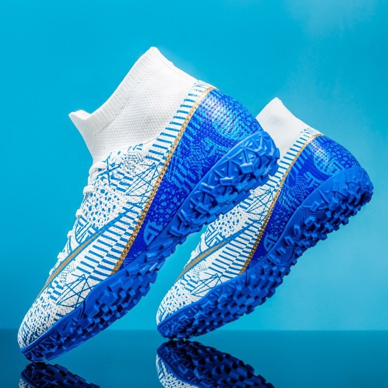 China Sports Kids Football Shoes from Size 28-45 Indoor Cleats Soccer Shoes with Genuine Leather Lining Manufactured for Boys