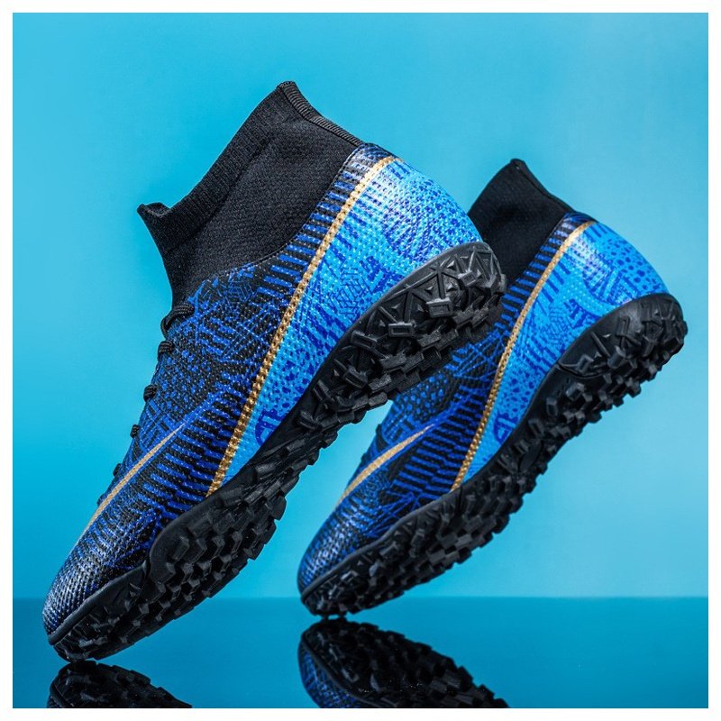 China Sports Kids Football Shoes from Size 28-45 Indoor Cleats Soccer Shoes with Genuine Leather Lining Manufactured for Boys