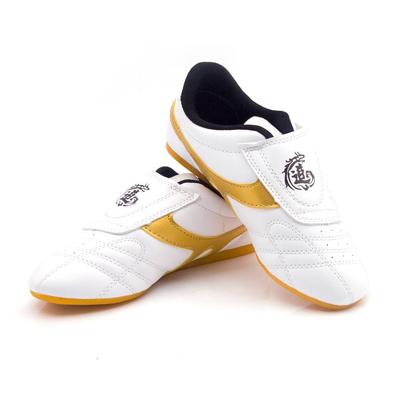 Specialized training in adult garment martial arts for girls in soft Thai boxing shoes