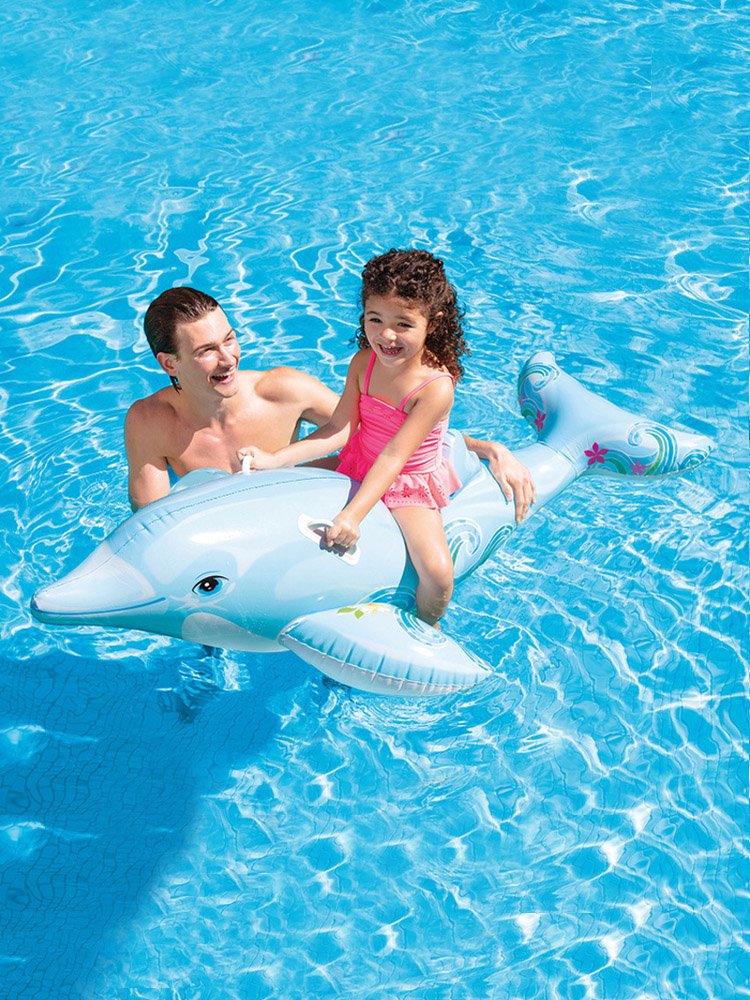 Swimming in the swimming ring, playing under the red armpits of the dolphins on the shark's toy