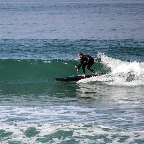 New professionals train sea-based surfboard beginners on water surfboards