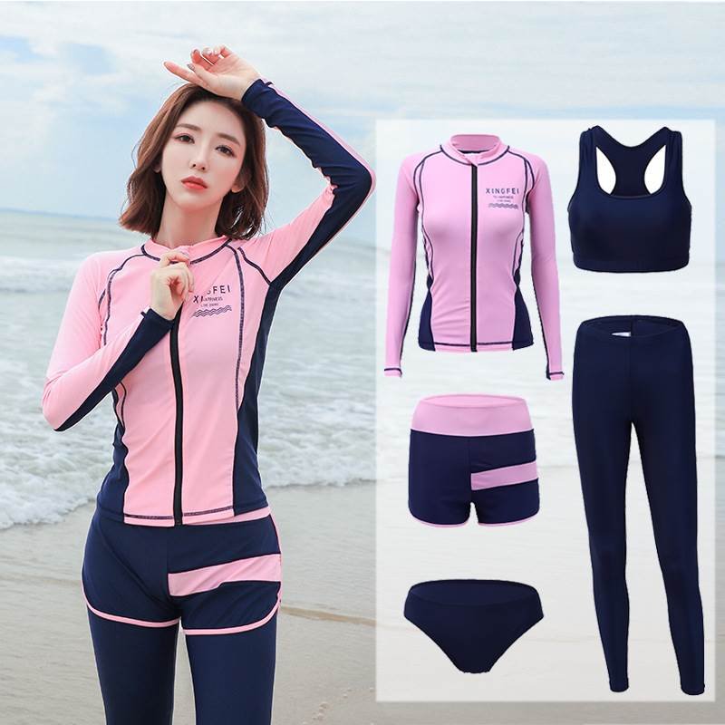 The Korean swimsuit lady with a long-sleeved swimsuit and a sunscreen jellyfish and shorts